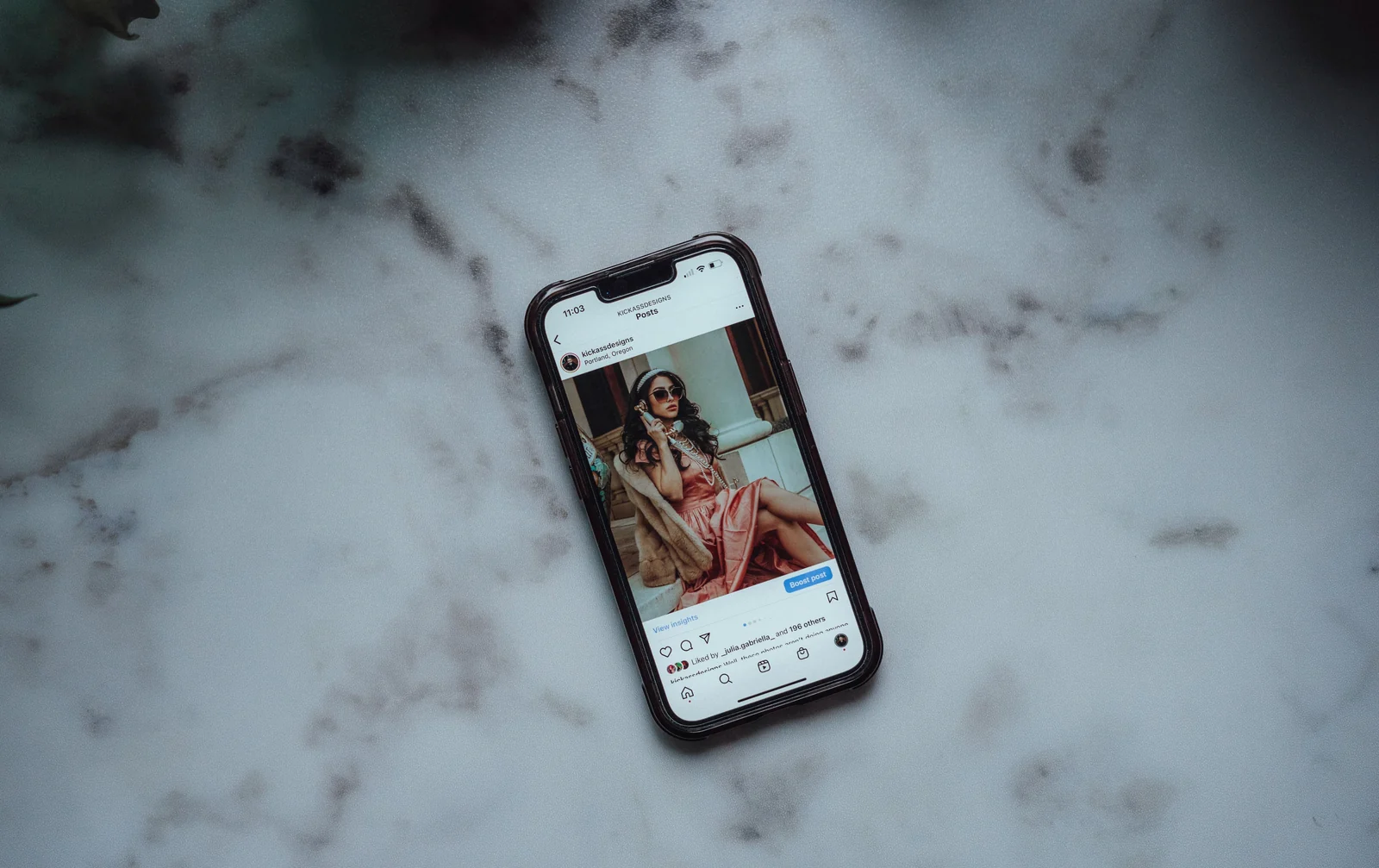 A fashion post displayed in the Instagram app on a smartphone